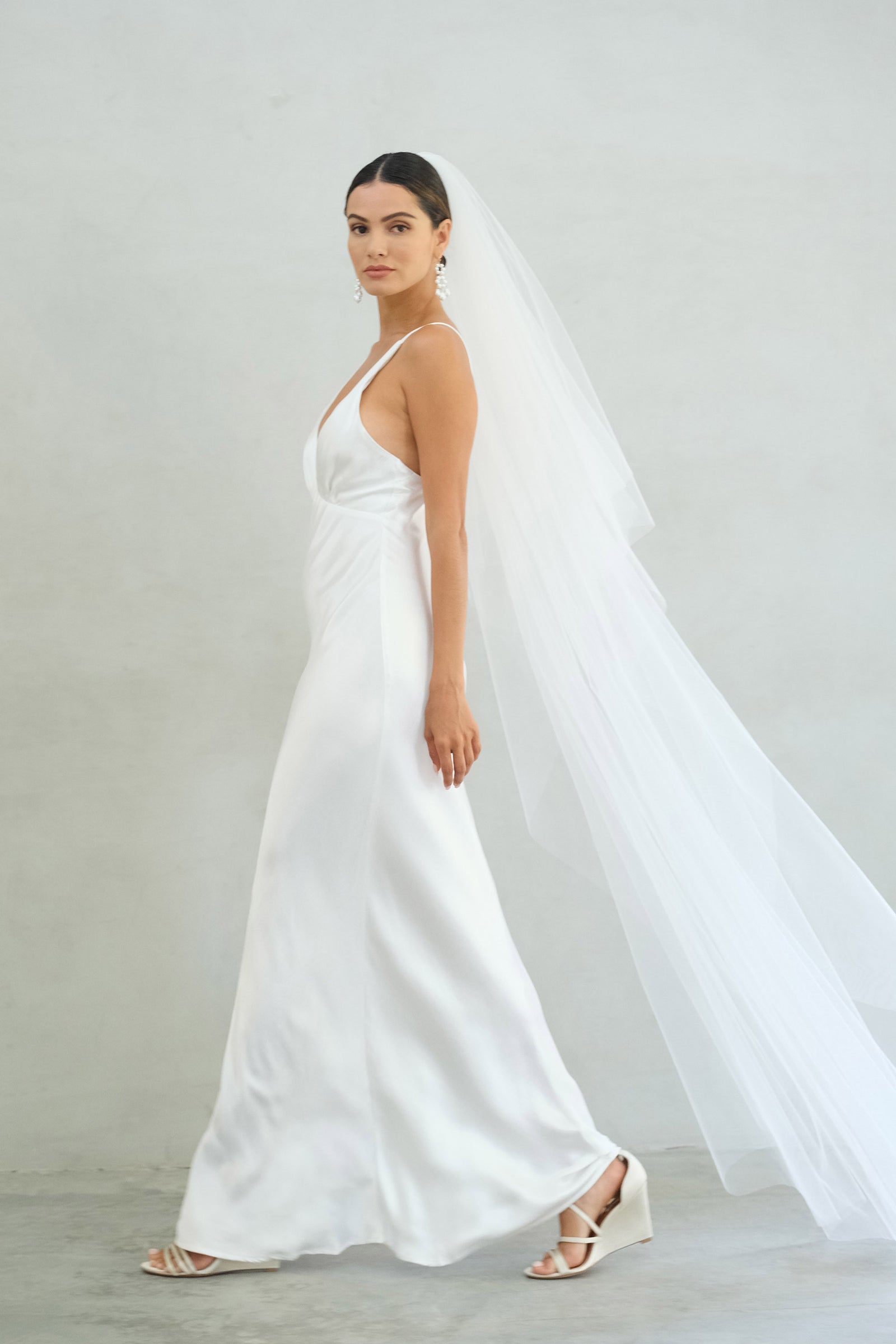 A model wearing the Alexa II two tier plain wedding veil by Madame Tulle bridal Sydney