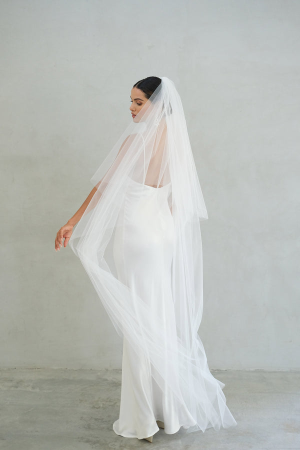 https://www.madametulle.com.au/cdn/shop/files/Alexa-II-two-tier-wedding-veil-with-blusher-madame-tulle-bridal-sydney-australia-05_600x.jpg?v=1698565285