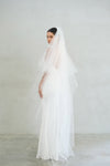 Bride wears ALEXA II two-tier plain veil made by Madame Tulle