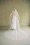 A model wearing the Alexa II two tier plain wedding veil by Madame Tulle bridal Sydney