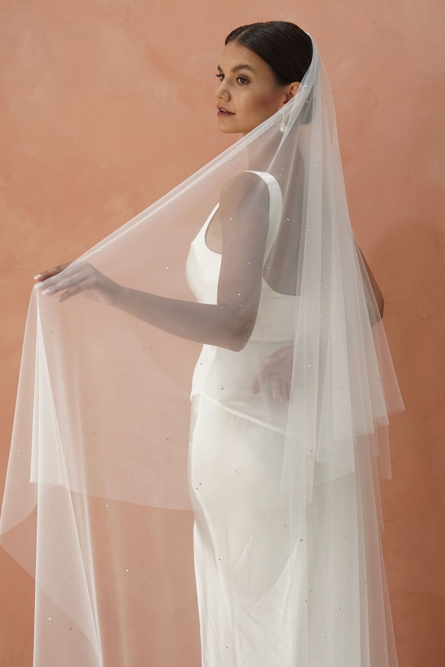 model wears drop veil with crystals,  two-tier wedding veil with crystal