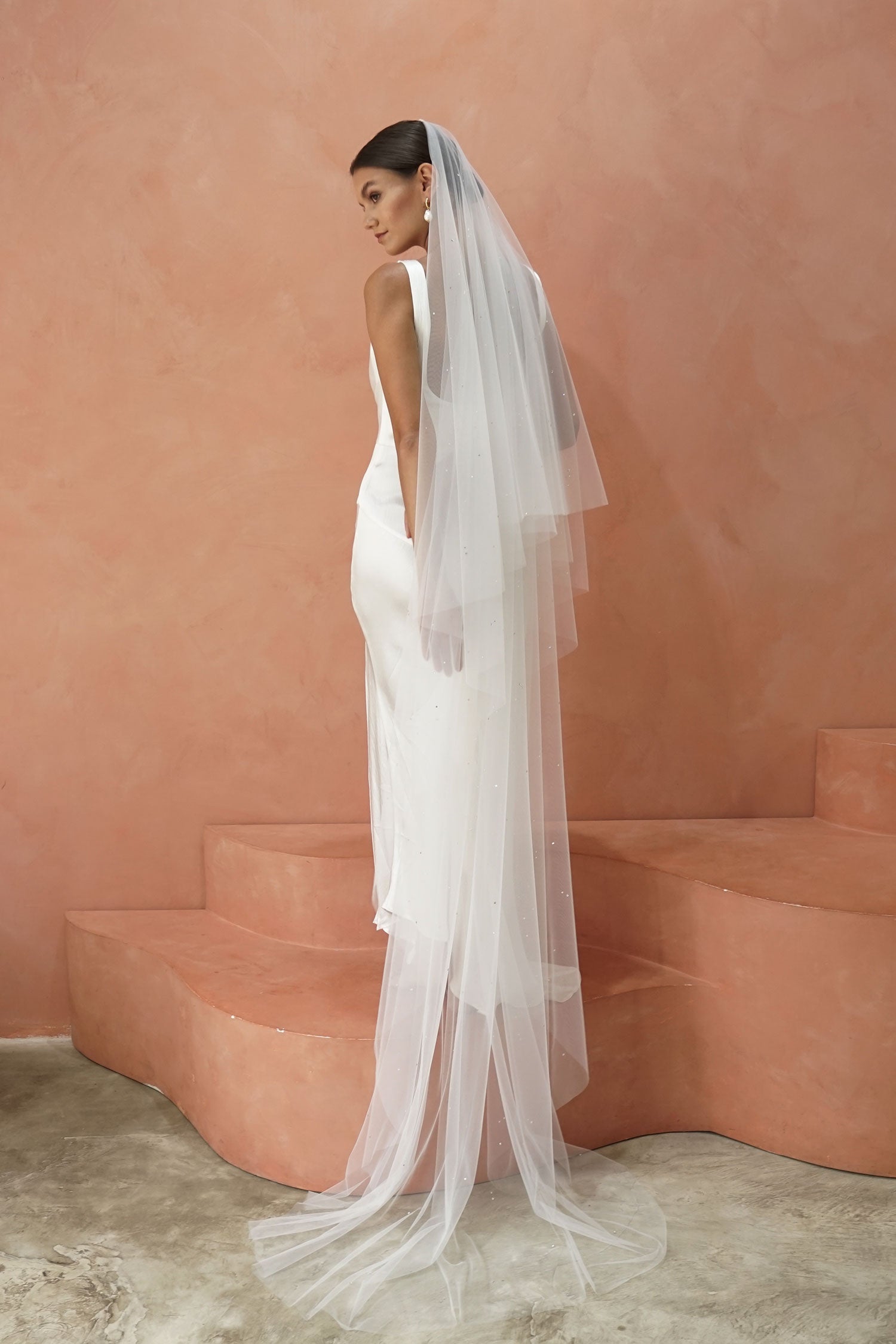 model wears drop veil with crystals,  two-tier wedding veil with crystal