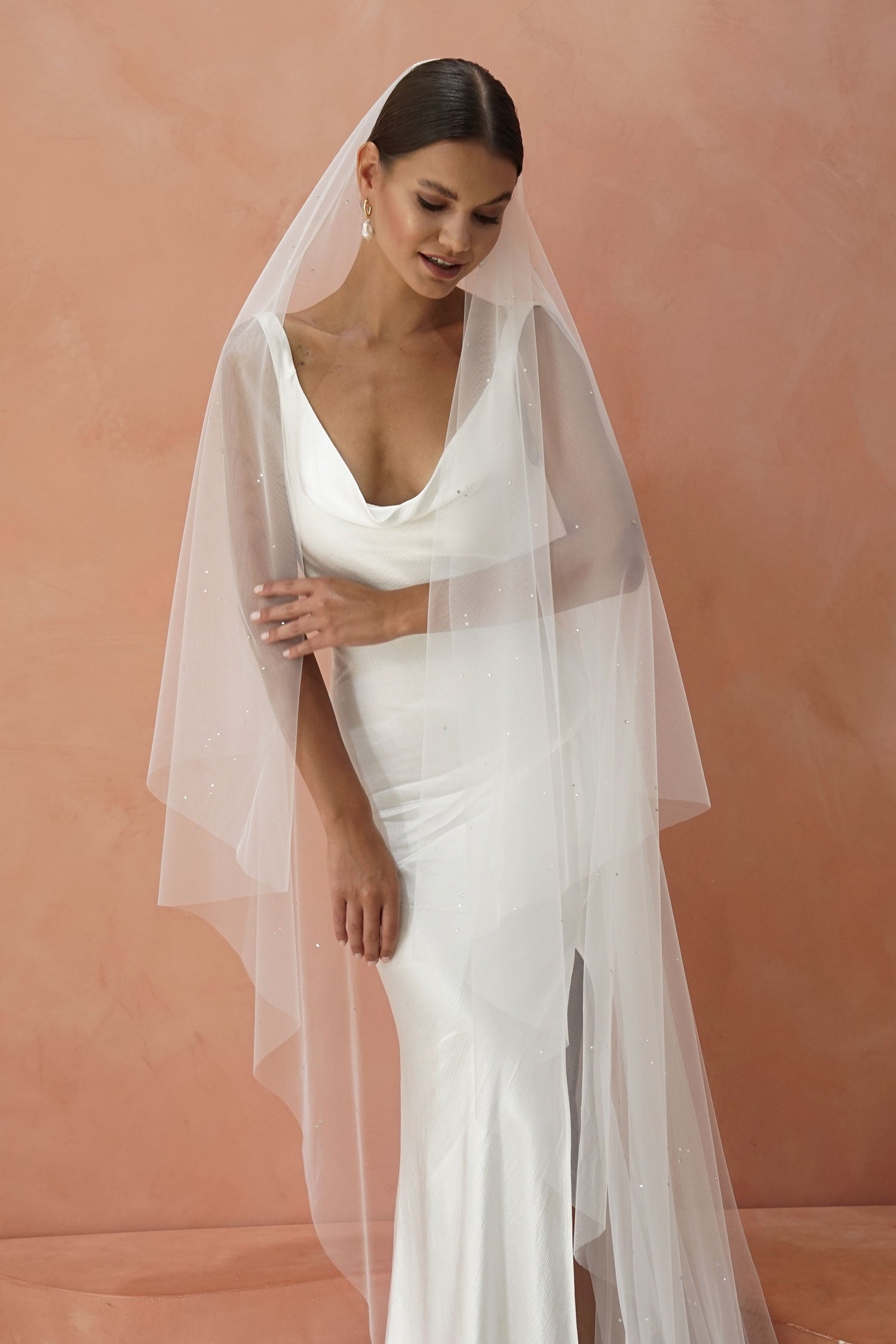 model wears drop veil with crystals,  two-tier wedding veil with crystal