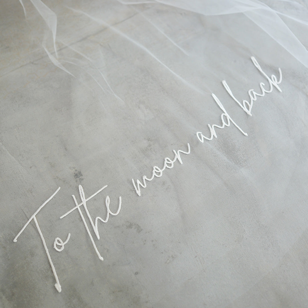 Romantic message embroidered to match handwriting on personalised veil by Madame Tulle bridal