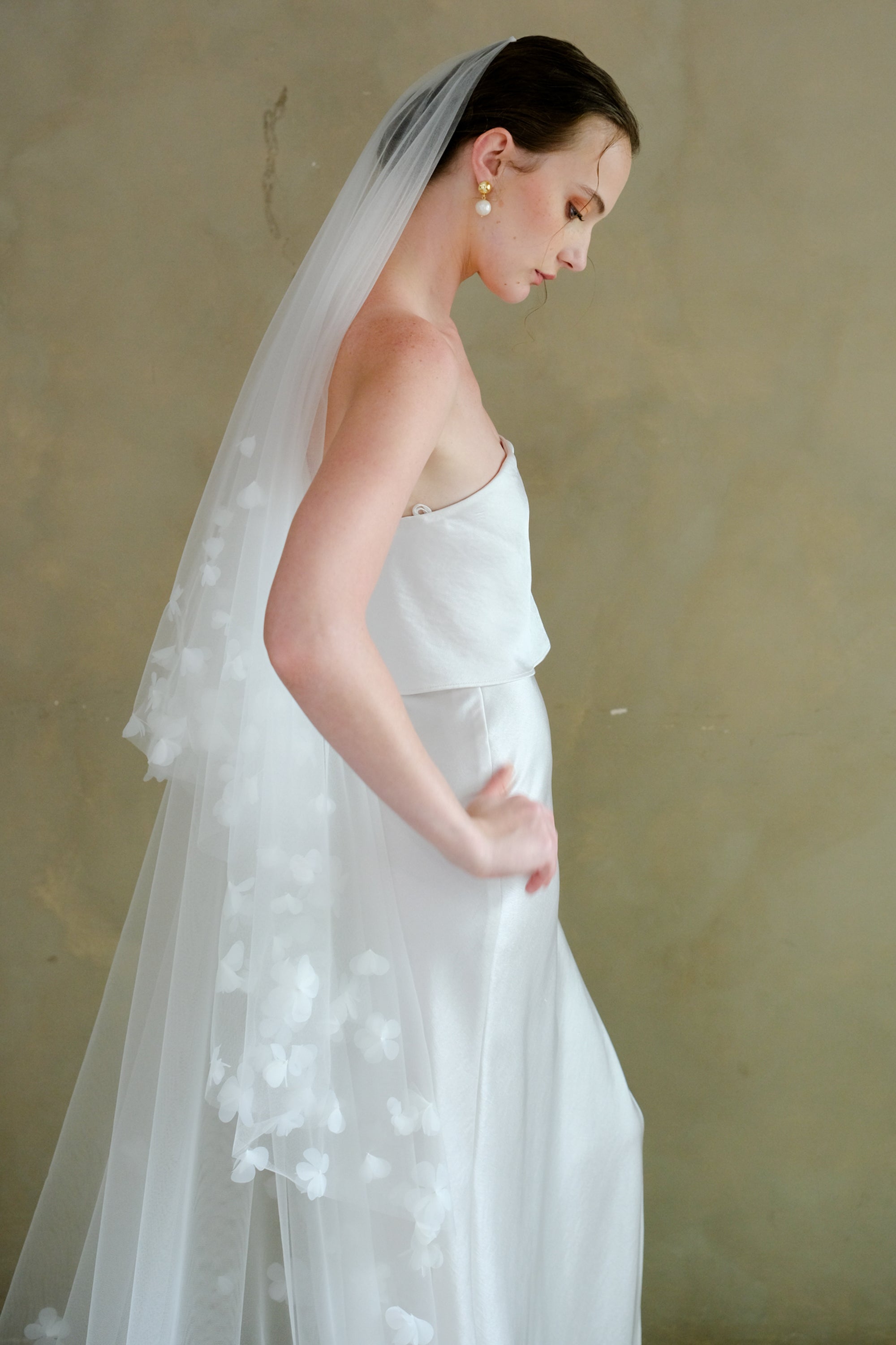Model wearing a two tier floral wedding veil made by Madame Tulle Australia