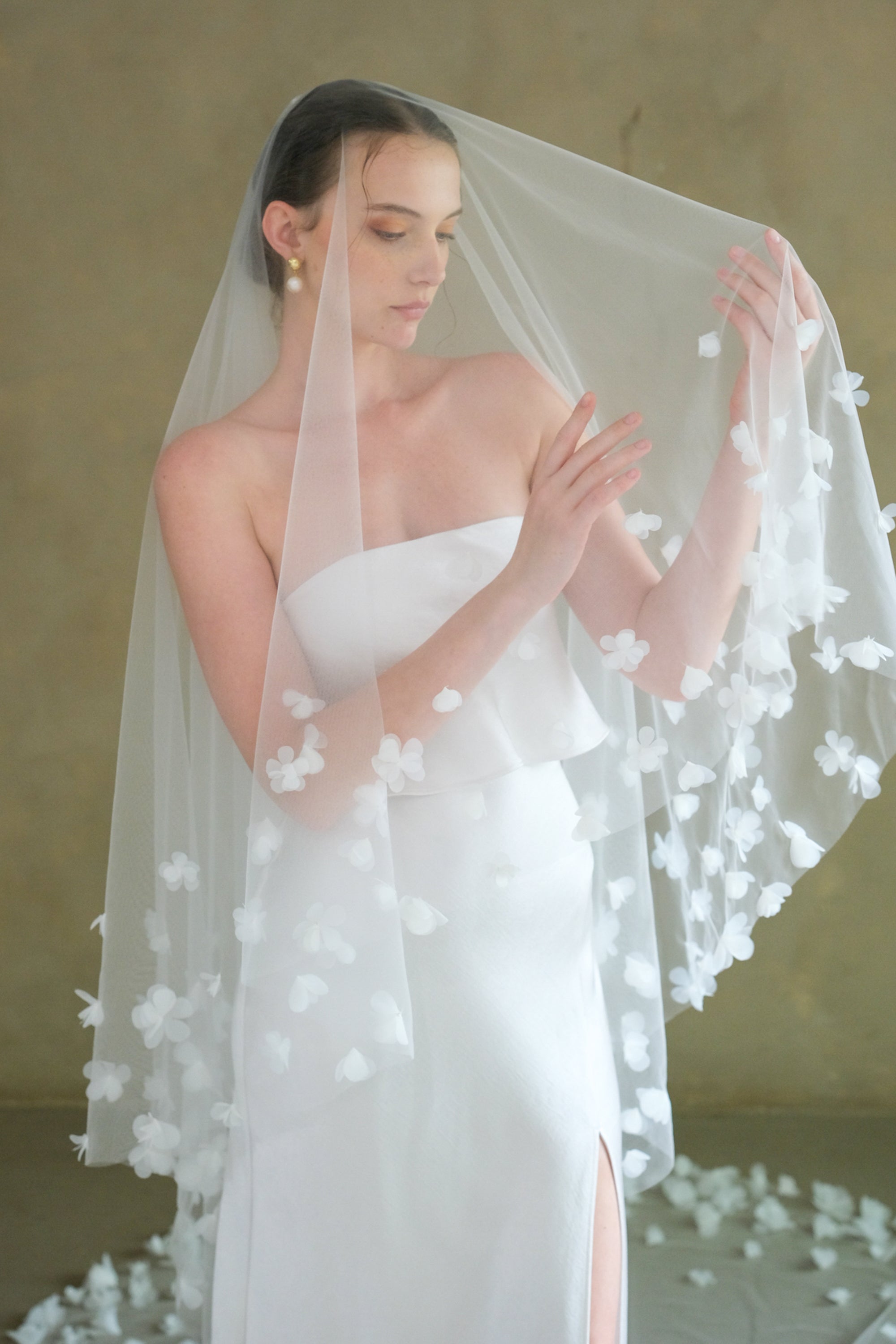 Model wearing a two tier floral wedding veil made by Madame Tulle Australia