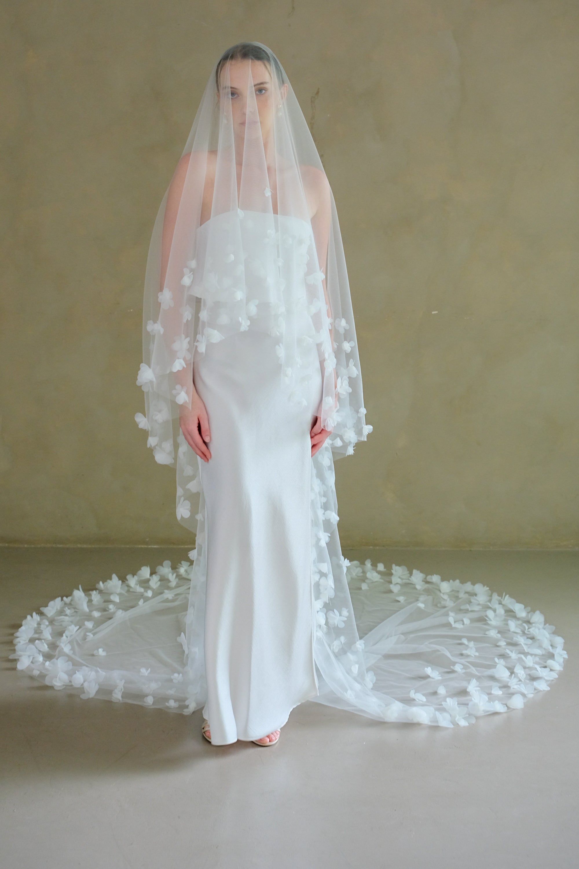 Model wearing a two tier floral wedding veil made by Madame Tulle Australia