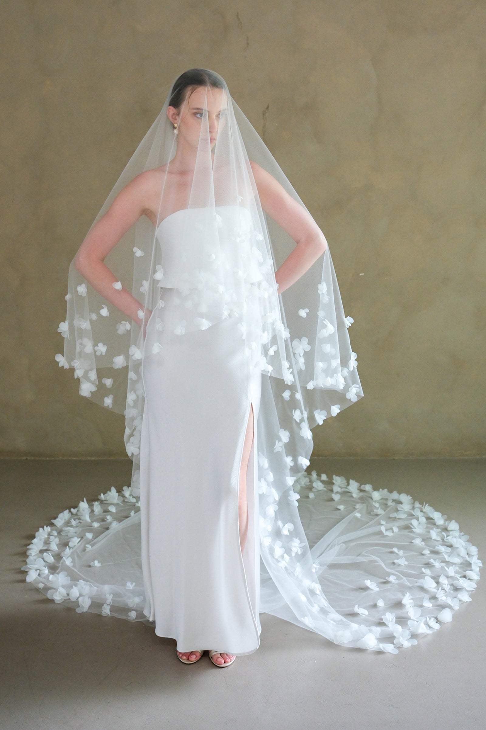 Model wearing a two tier floral wedding veil made by Madame Tulle Australia