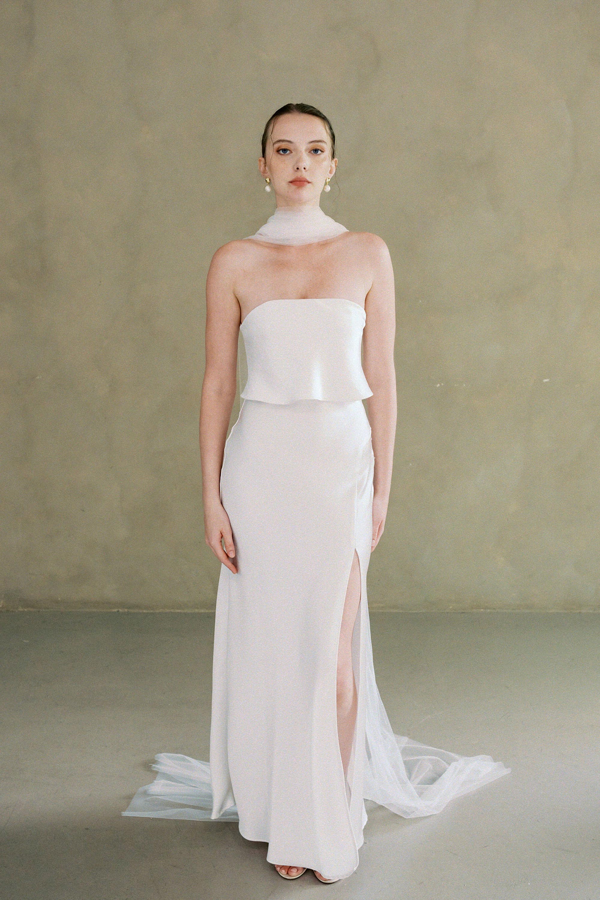 model wears soft tule wedding scarf 