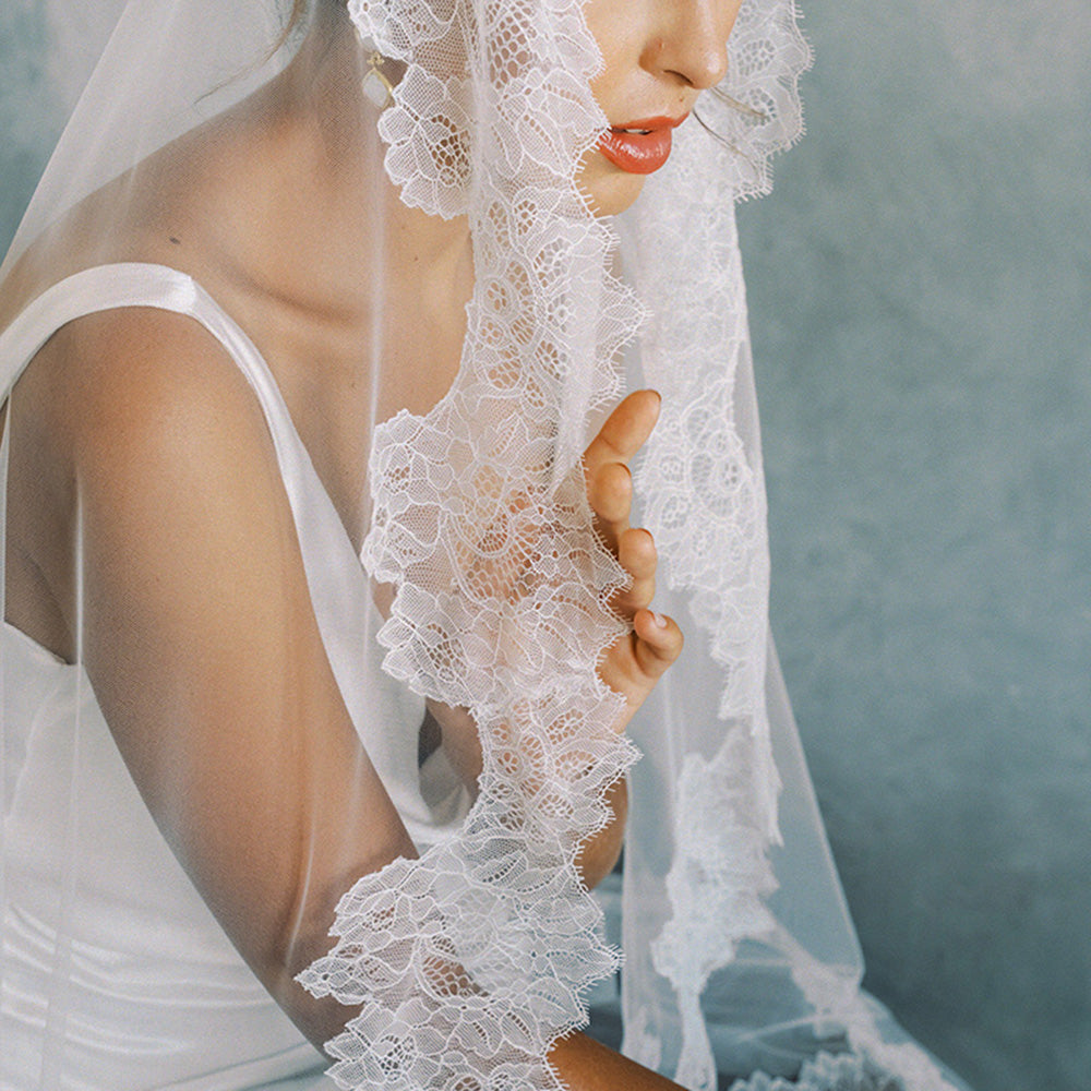 Close up of scalloped chantilly lace trim on bridal veil by Madame Tulle Sydney