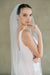 model wears a one-tier glitter veil 