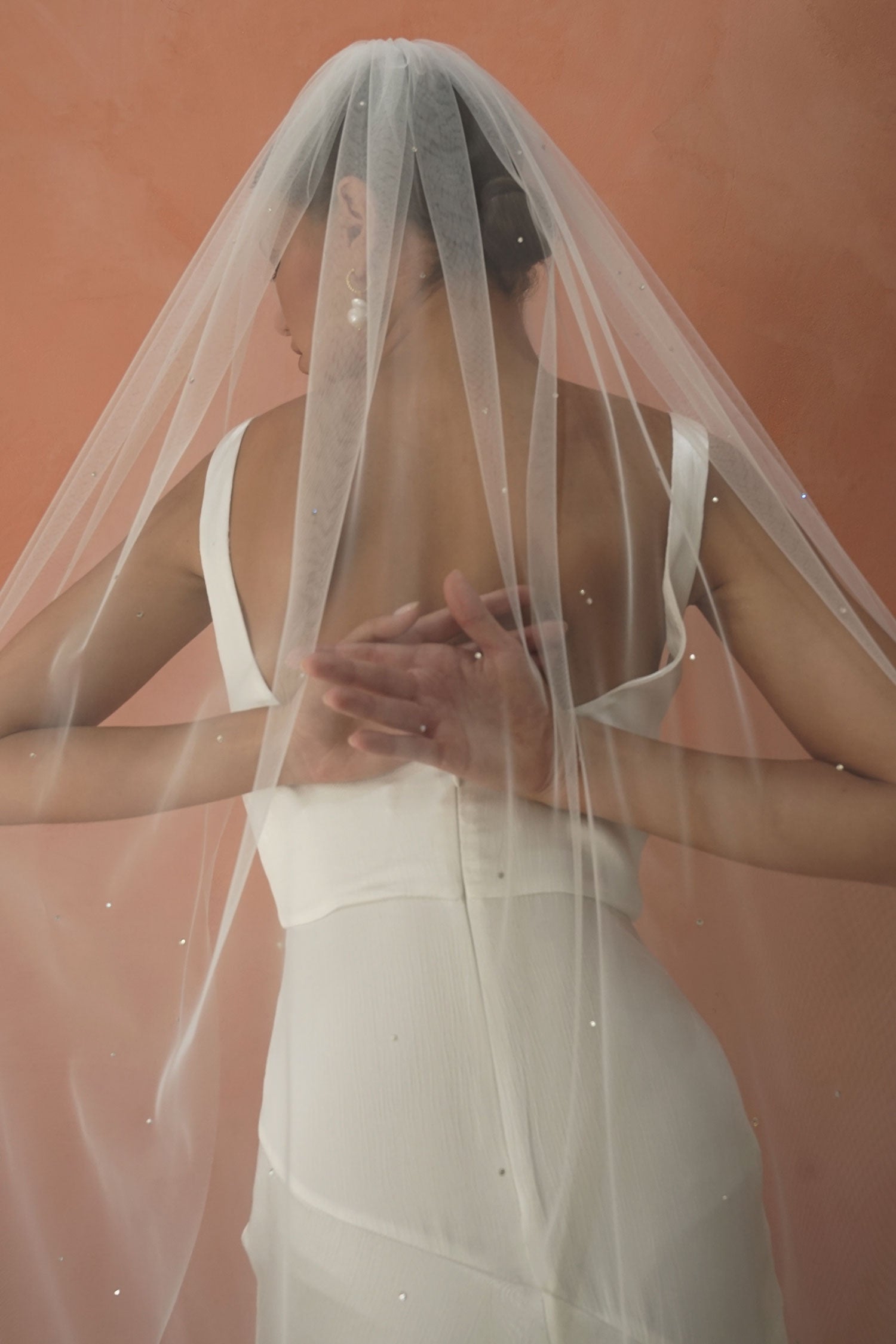 model wears one tier veil with crystals, crystal wedding veil 