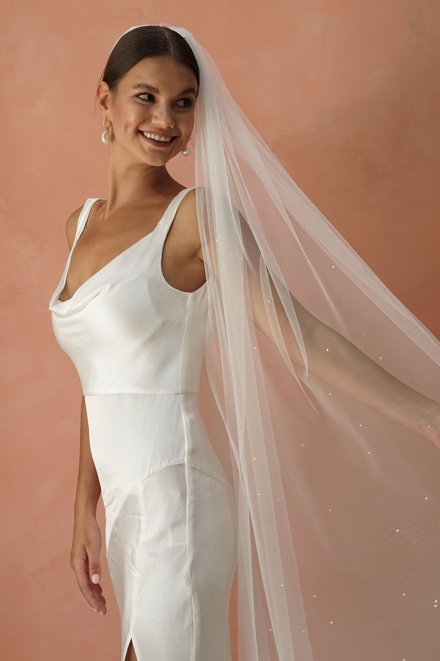 model wears one tier veil with crystals, crystal wedding veil 