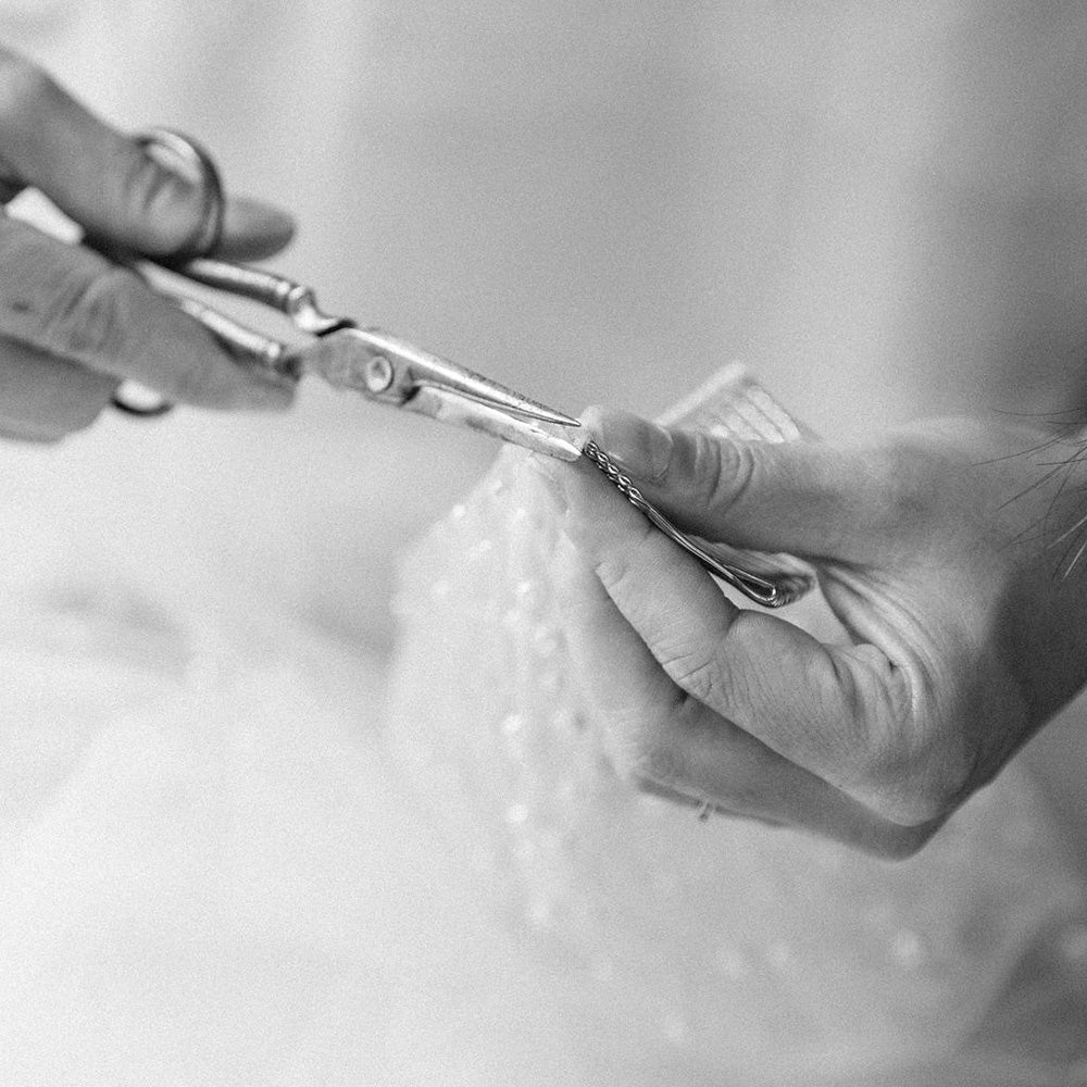 Close up of hand finishing work on bridal veil by Madame Tulle Sydney
