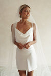 A model wearing always and forever embroidered veil by Madame Tulle bridal