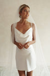 A model wearing a one tier wedding veil