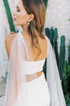 A model wearing the ALYSSA tulle wings by Madame Tulle bridal