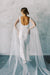 Model wears a detachable tulle wings with pearls