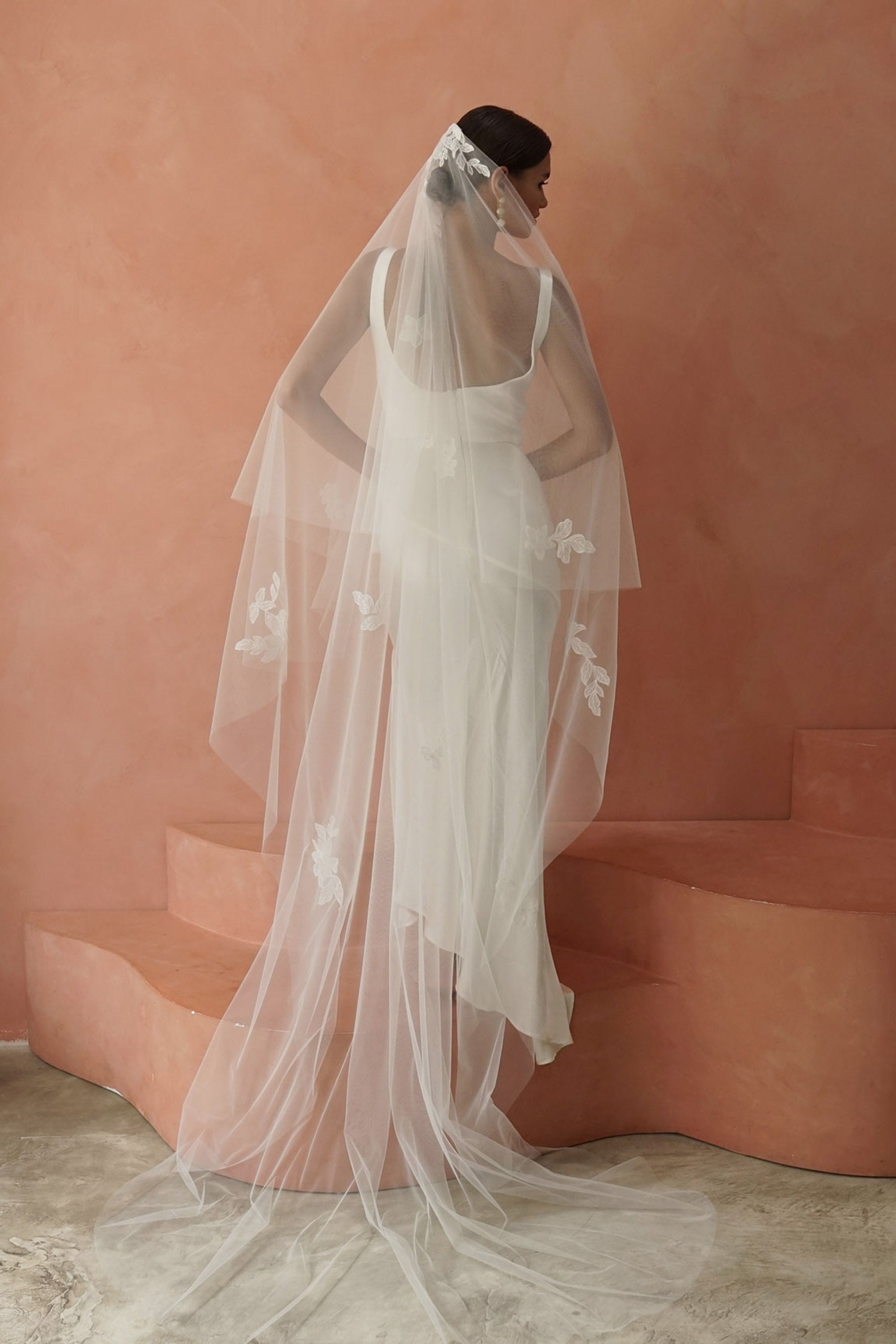 model wears two-tier lace appliqués wedding veil, drop veil with lace appliqués