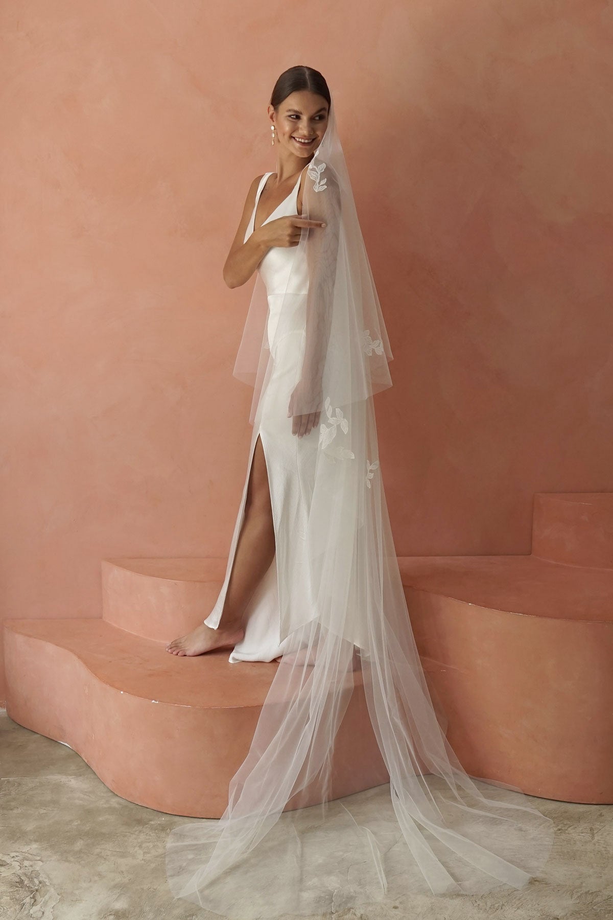 model wears two-tier lace appliqués wedding veil, drop veil with lace appliqués