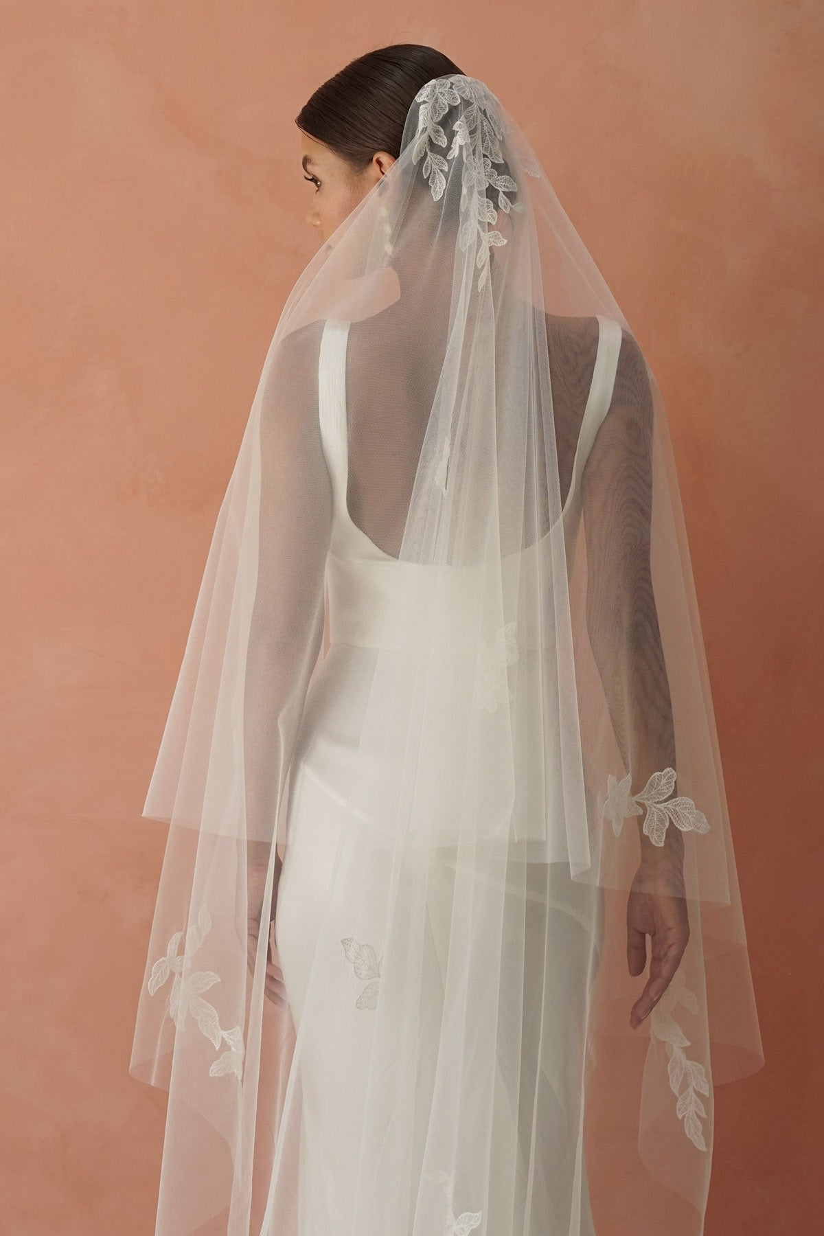 model wears two-tier lace appliqués wedding veil, drop veil with lace appliqués