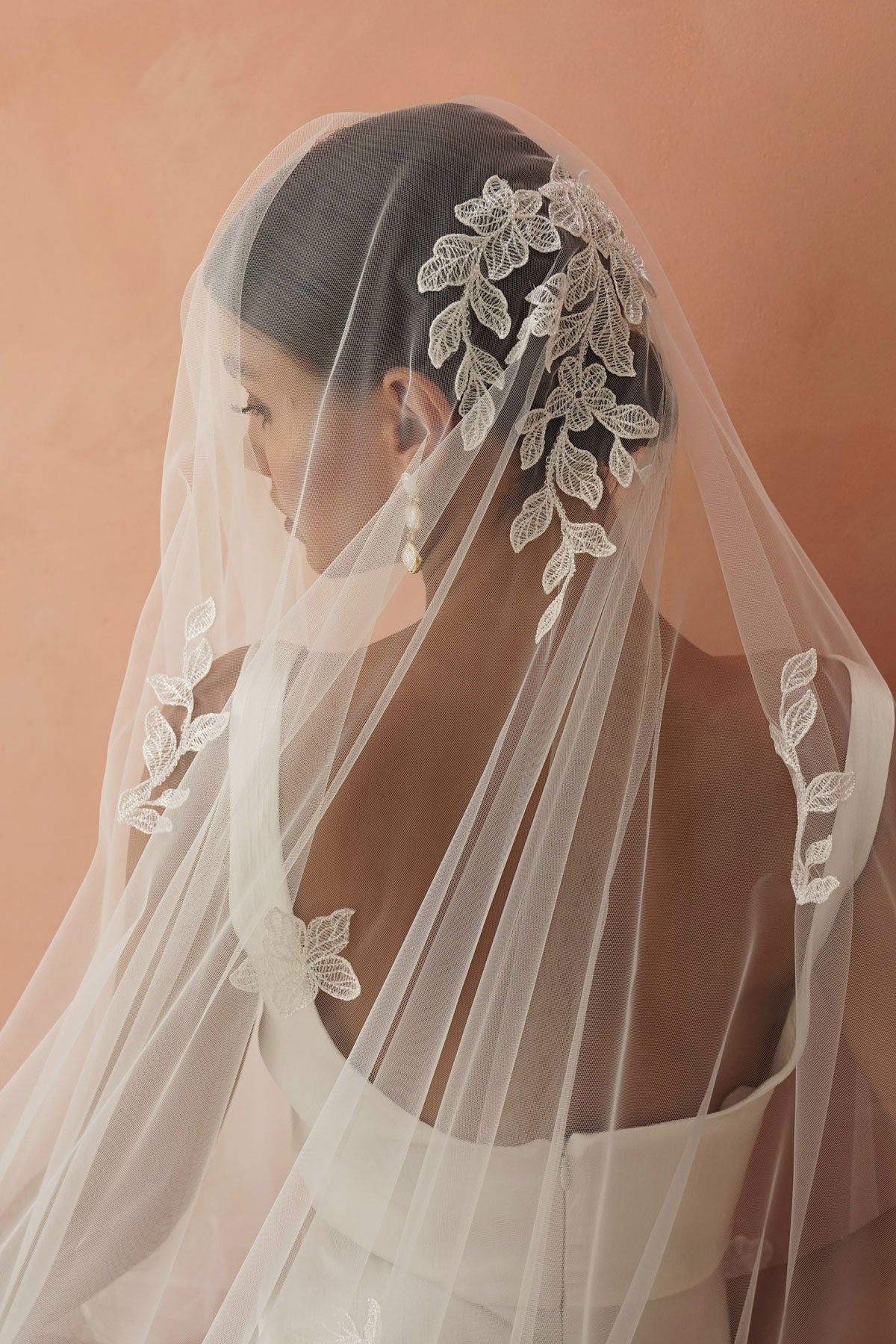 model wears two-tier lace appliqués wedding veil, drop veil with lace appliqués