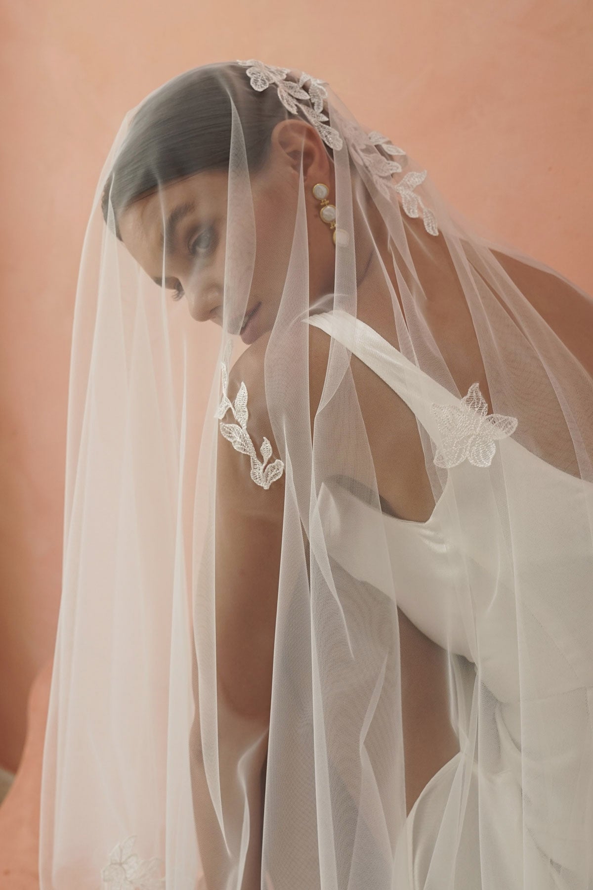 model wears two-tier lace appliqués wedding veil, drop veil with lace appliqués