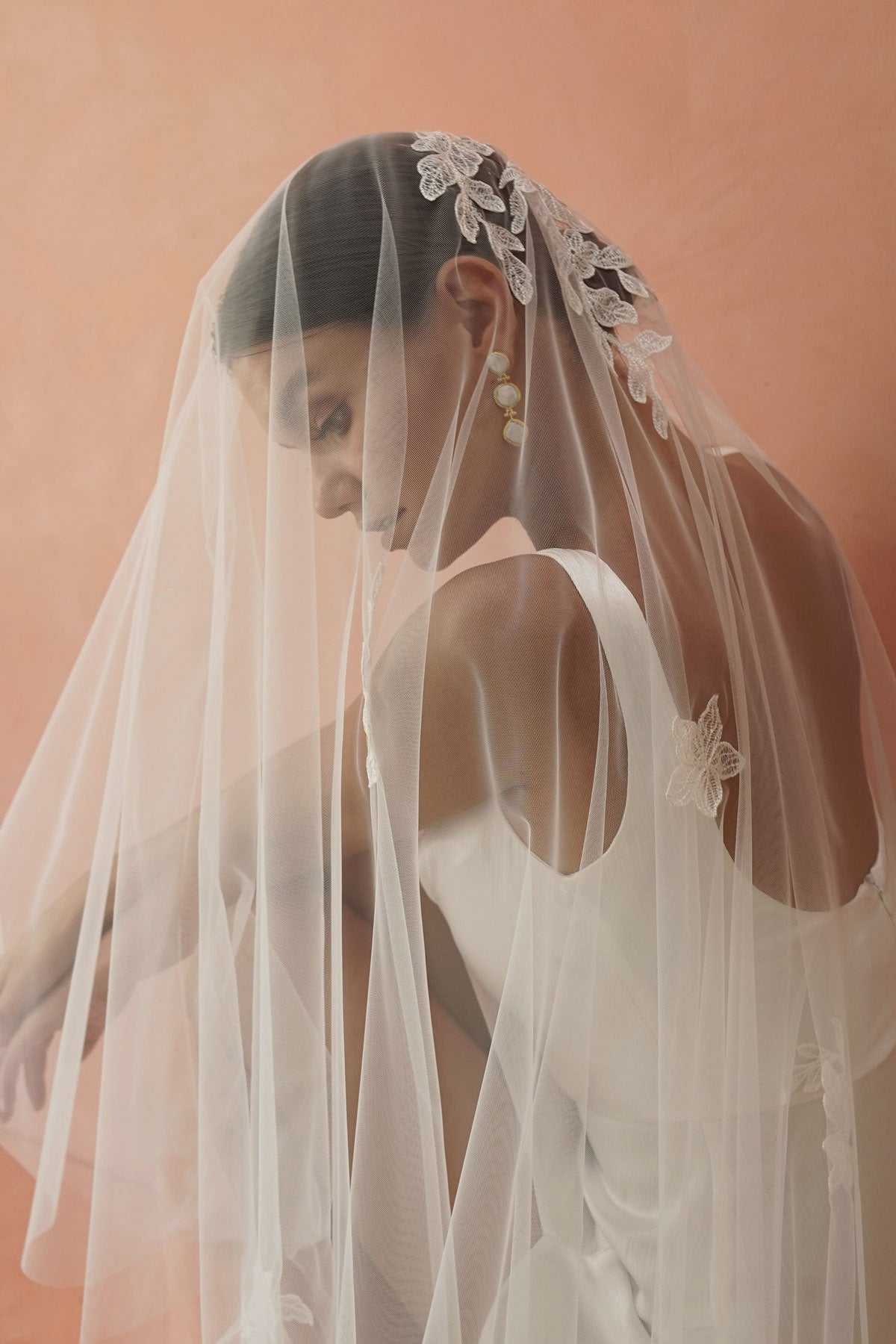 model wears two-tier lace appliqués wedding veil, drop veil with lace appliqués