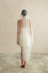 A model wearing STELLA II, a two tier wedding veil with crystals by Madame Tulle