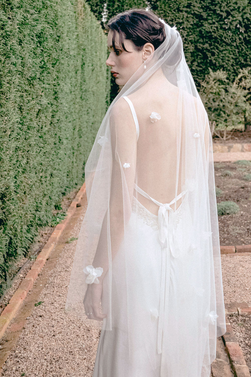 Model wearing a one tier floral wedding veil made by Madame Tulle Australia