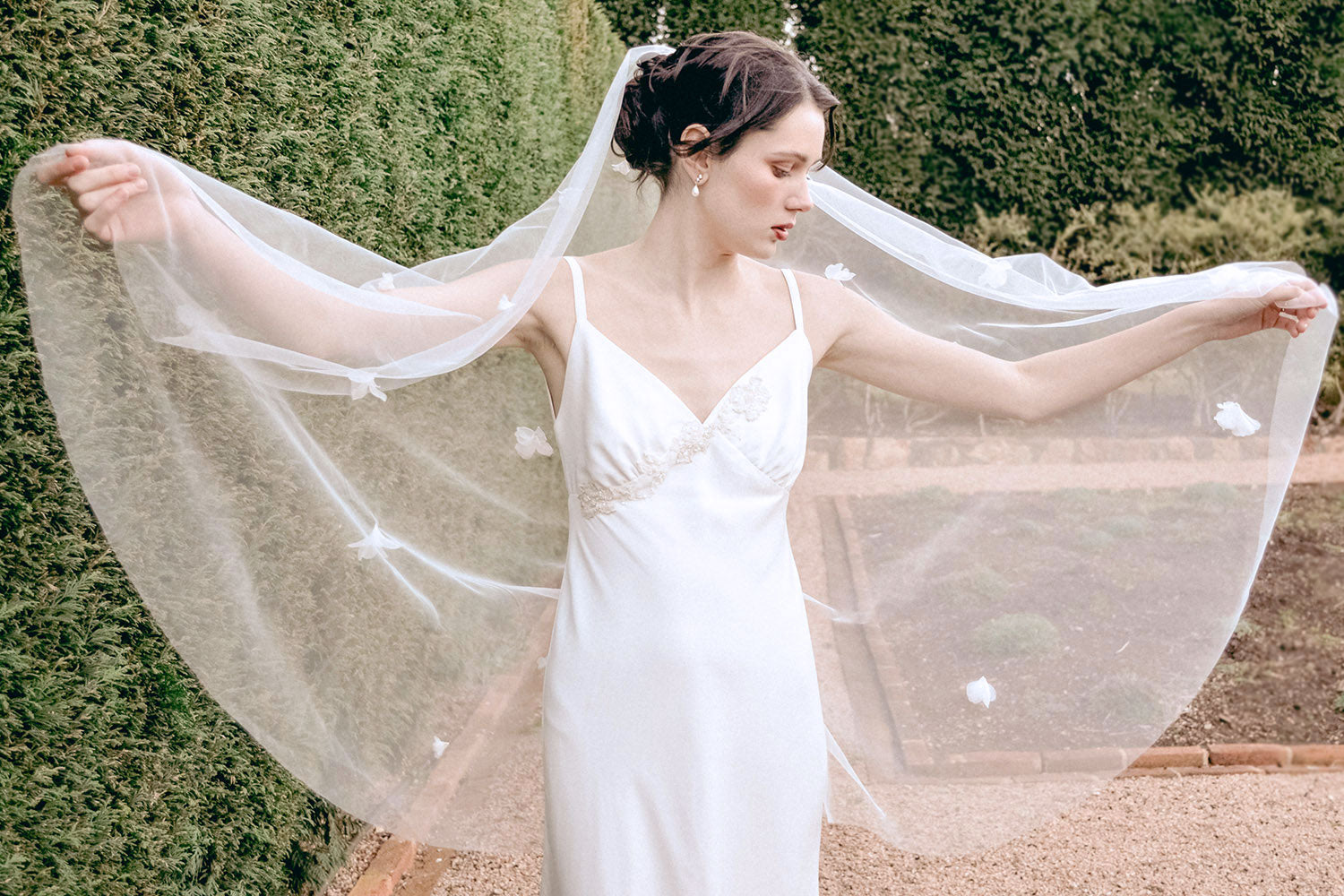 Model wearing a one tier floral wedding veil made by Madame Tulle Australia