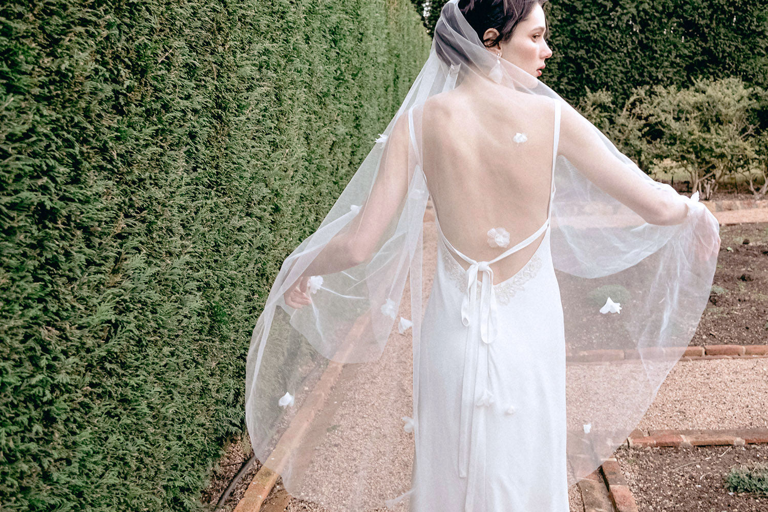 Model wearing a one tier floral wedding veil made by Madame Tulle Australia