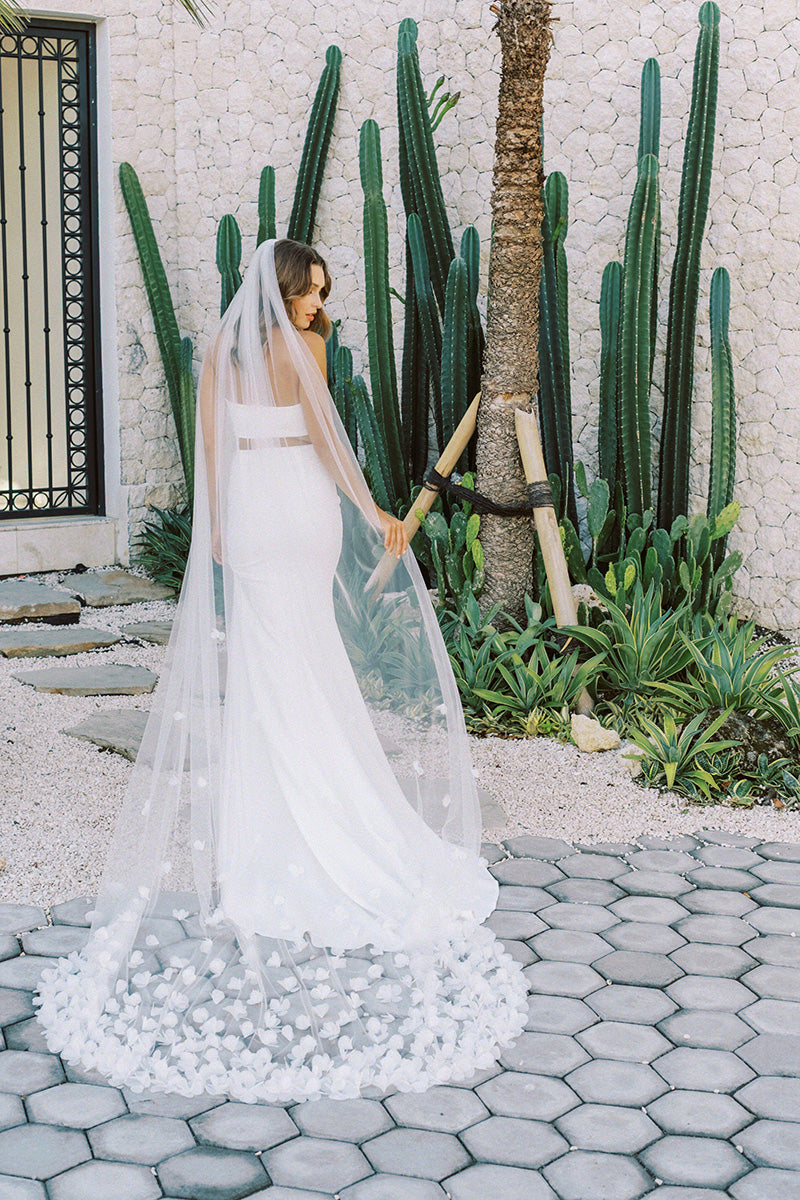 model wears wedding veil with organza flowers, floral veil