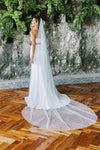 A model wearing a one tier pearl wedding veil 