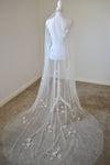 model wears a one-tier handmade flowers wedding veil, floral veil