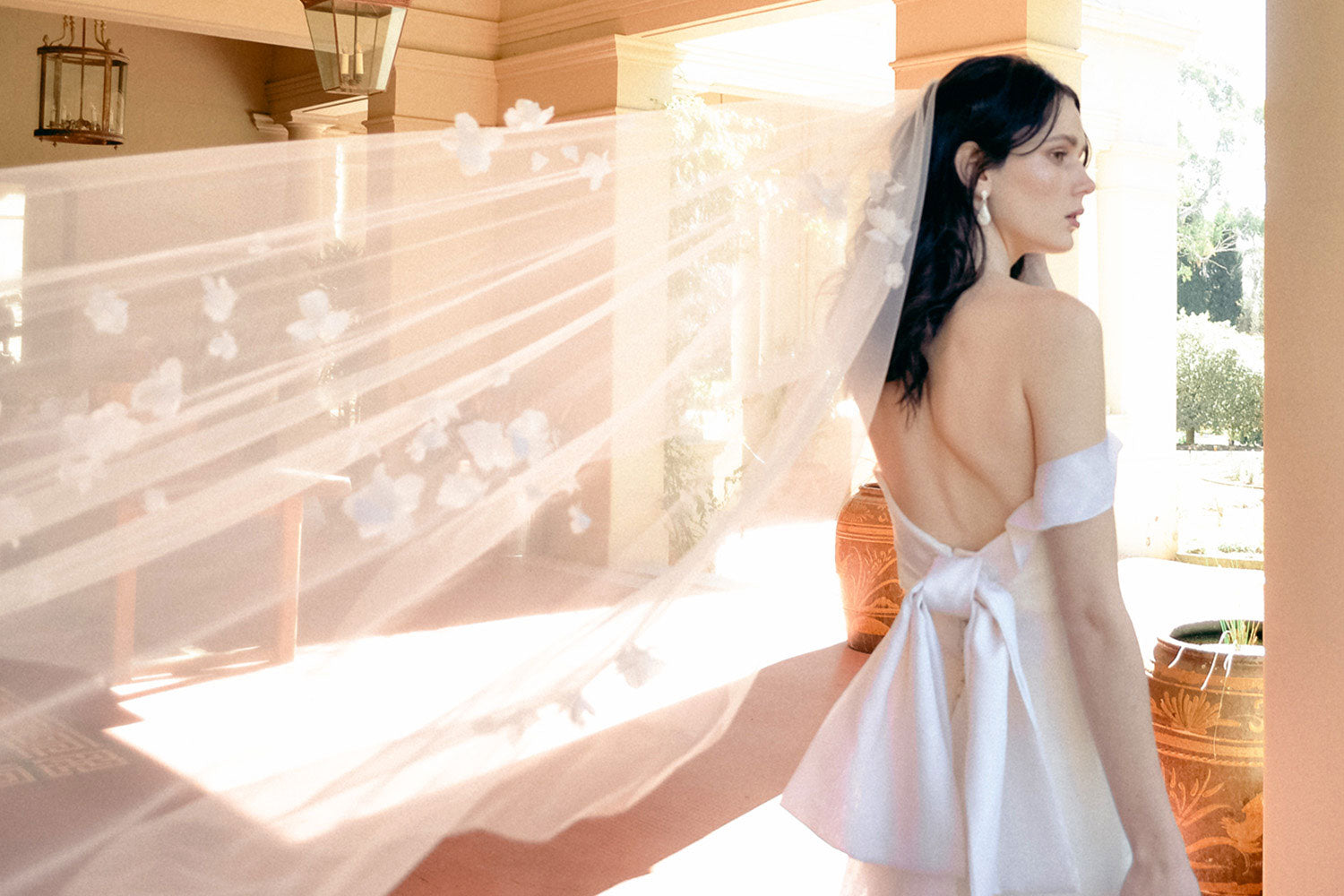 model wears a one-tier handmade flowers wedding veil, floral veil