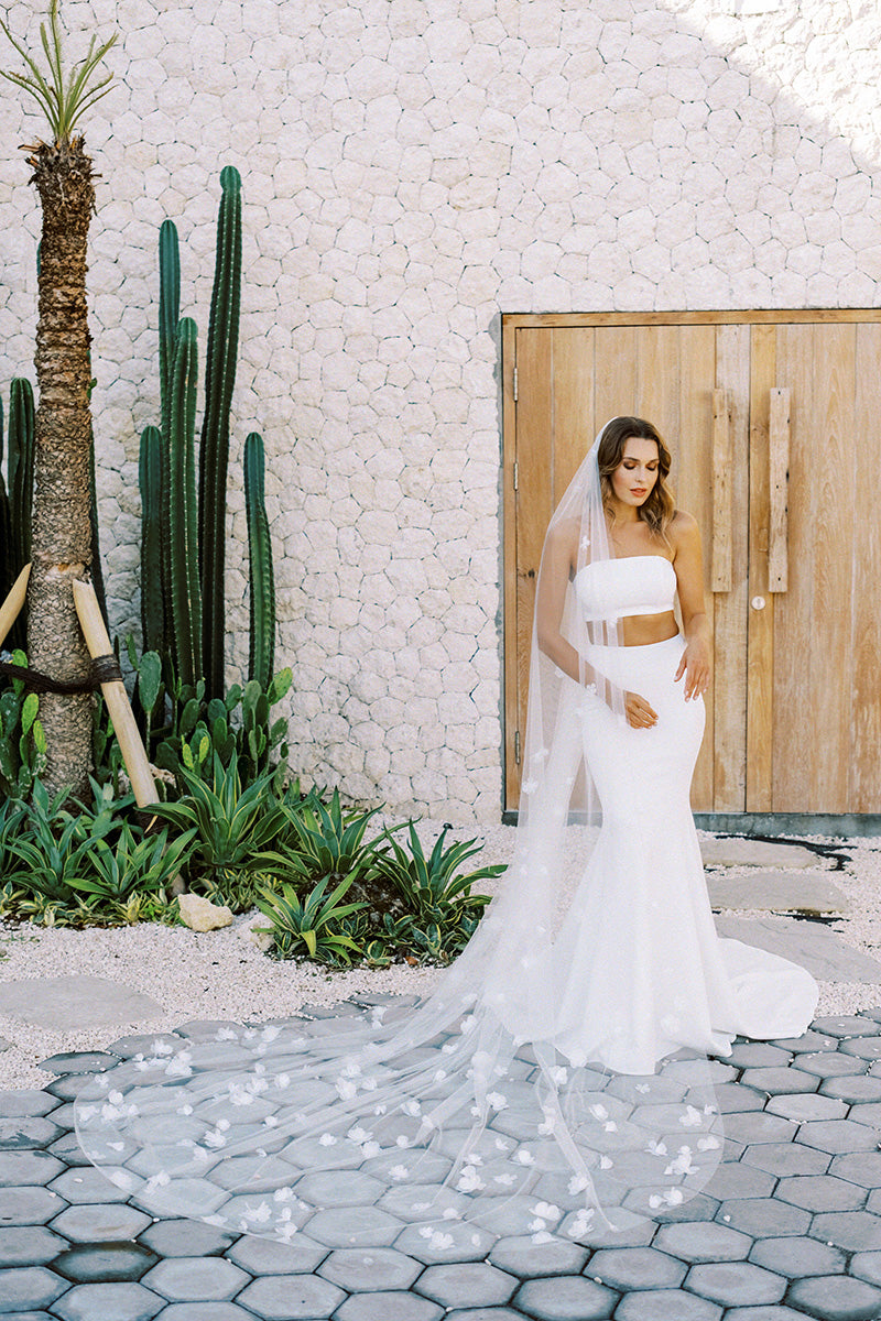 model wears a one-tier handmade three dimensional organza flowers wedding veil, floral veil