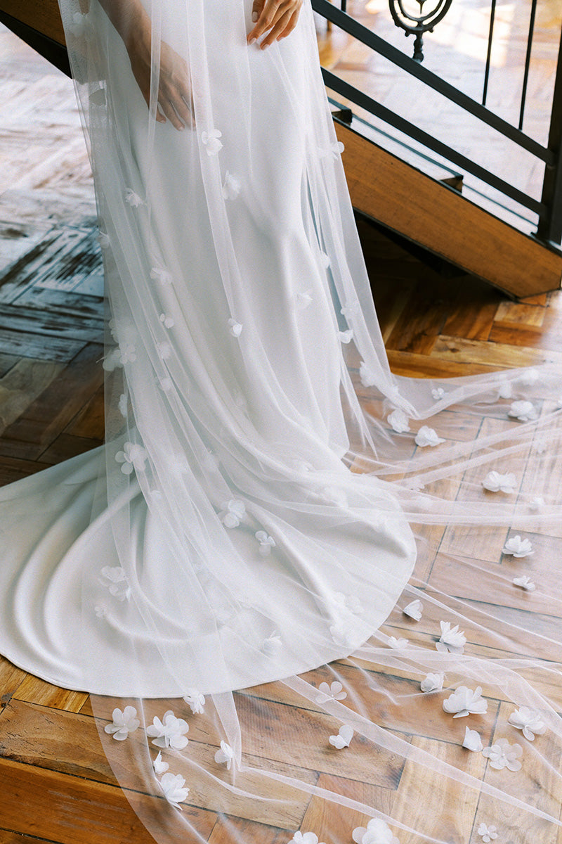 model wears a one-tier handmade three dimensional organza flowers wedding veil, floral veil