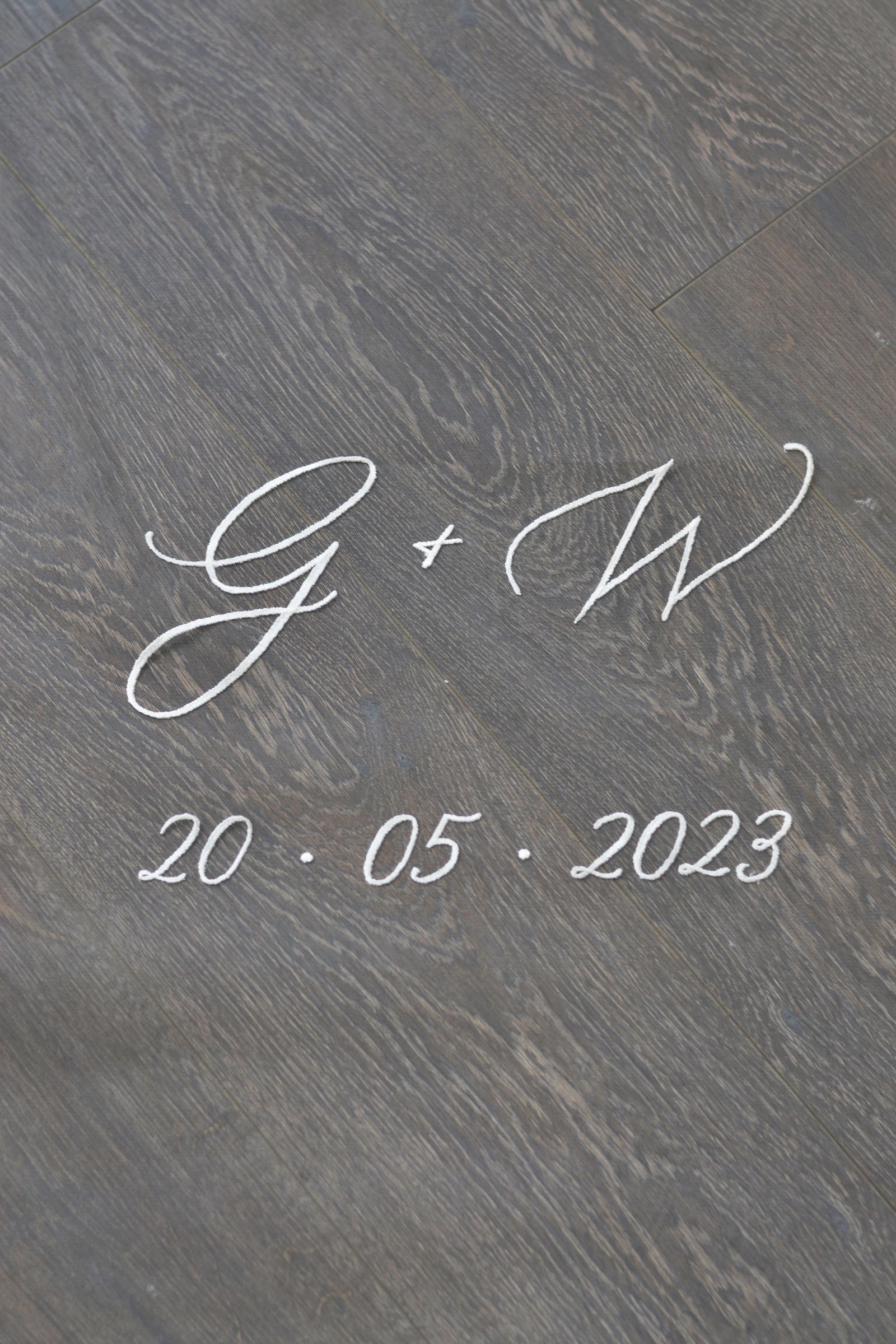 A wedding with personalised embroidery bride and groom's initials and wedding date