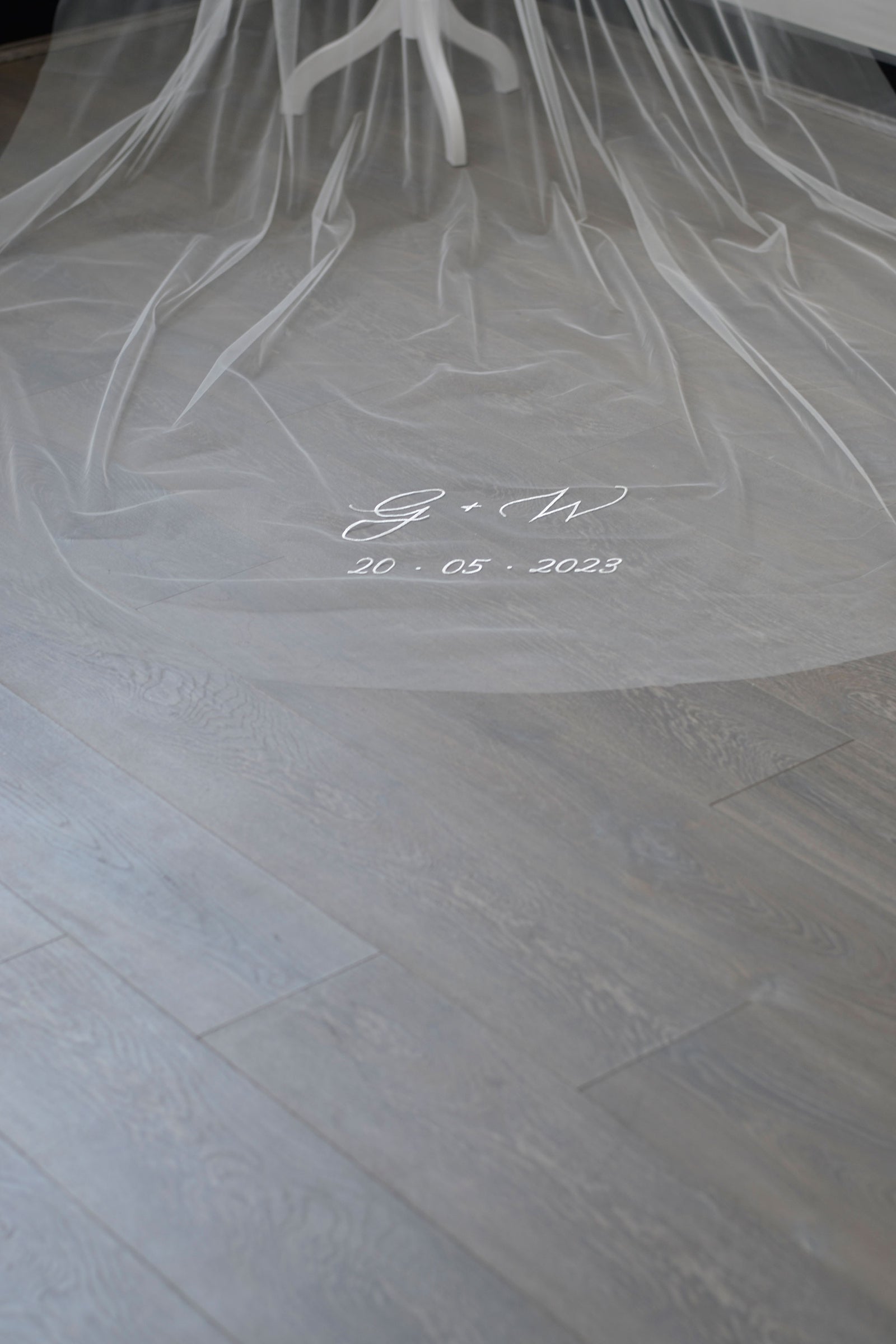 A wedding with personalised embroidery bride and groom's initials and wedding date