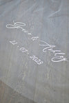 A wedding with veil personalisation embroidery bride and groom&#39;s names and wedding date